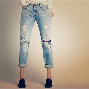 Distressed boyfriend jeans