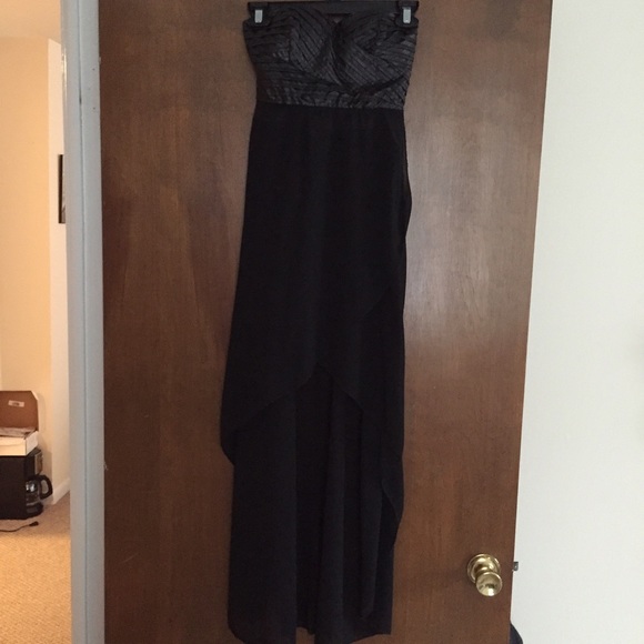 High-low black dress with leather detailing