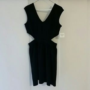 Black cropped dress.  Will fit size 6 -8