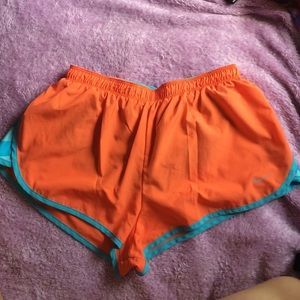 Orange and blue nike shorts