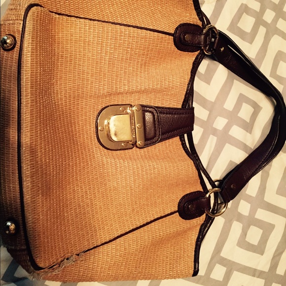 Authentic Michael Kors straw bag.