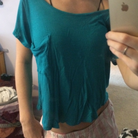 Versatile teal blue top, w/ lace design in back