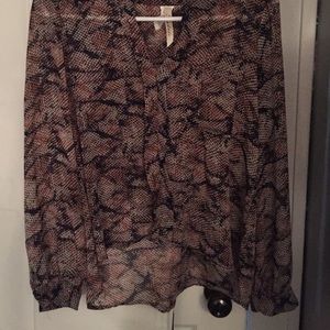 Andree brand from the Buckle Long Sleeved Top