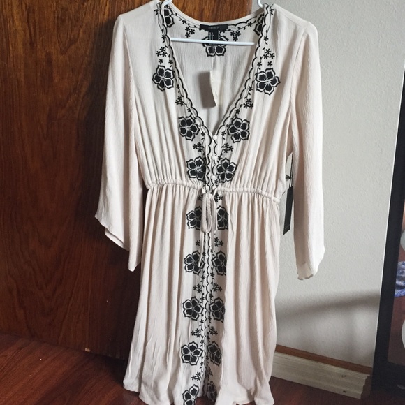 Taupe, black dress