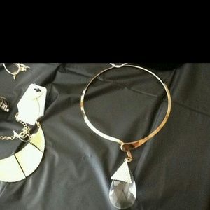 Gold tone necklace with crysyal drop