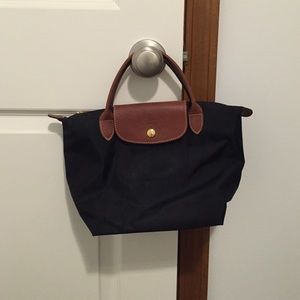 Reposhing an authentic mini longchamp bag