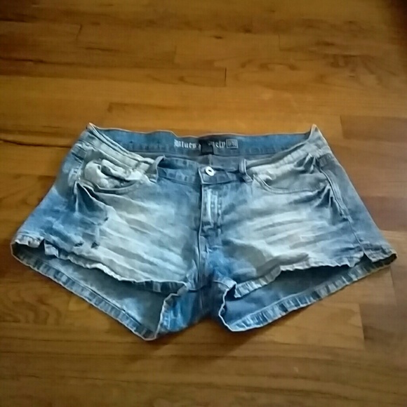 Blue shorts with rips
