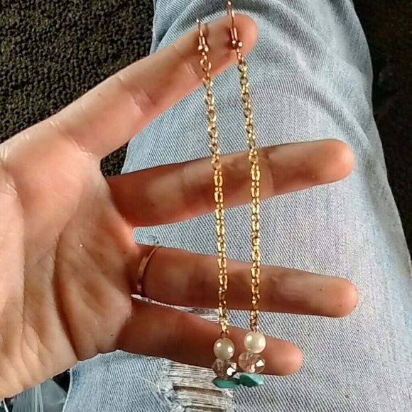 Dramatically long earrings