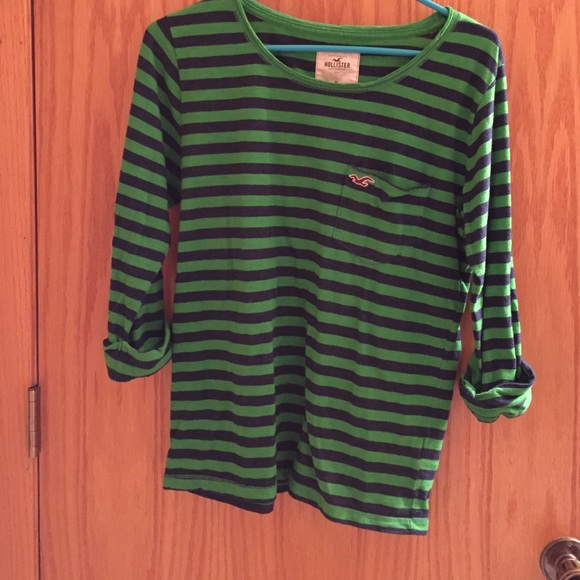 Slightly used green striped 3/4 long sleeve shirt.