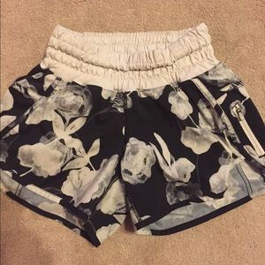 Black and white Lululemon flowered Tracker shorts