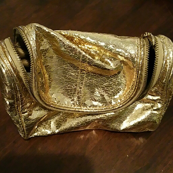 Gold makeup bag