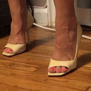 Nude (light colored) patent leather peep toe heels
