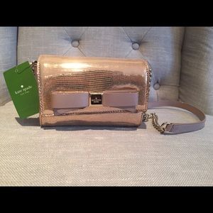 Gold Kate Spade purse.