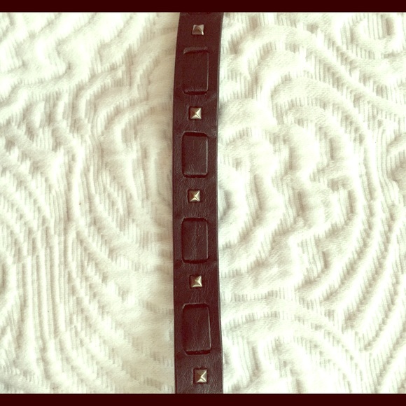 Thin black belt with studded detailing