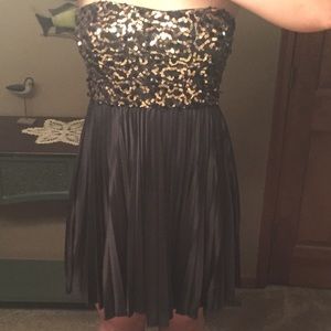 Black and gold sequin dress