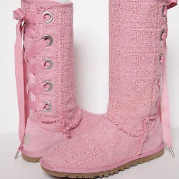 Pink Ugg boots with lace up backs