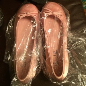 Pair of pink flats never worn!