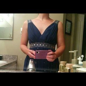 Flowing navy blue semi-formal dress with details