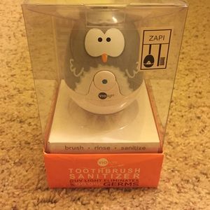 Toothbrush sanitizer