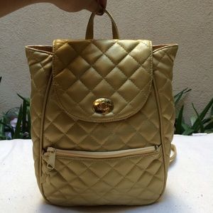 Gold, vintage mini backpack