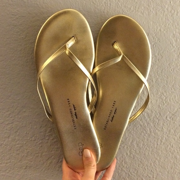 Gold flip flops