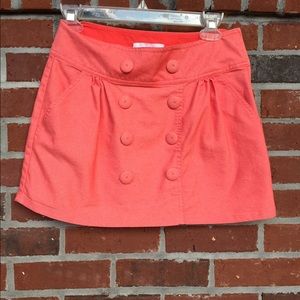 Orange Charlotte Russe skirt with buttons