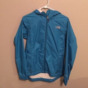Light North Face Turquoise windbreaker.