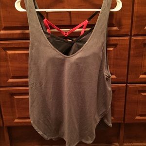 Light gray tank. Never been worn.
