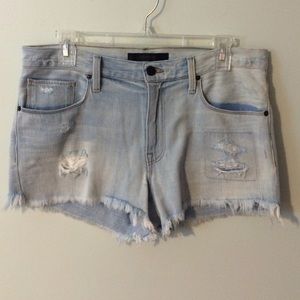 Light was ripped cutoff shorts