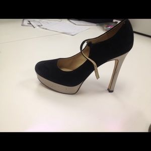 Cute high heels black with gold heel and bottom