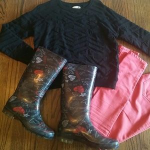 Black and red Coach poppy rainboots