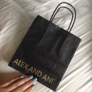 3 Alex and Ani bags with wrapping