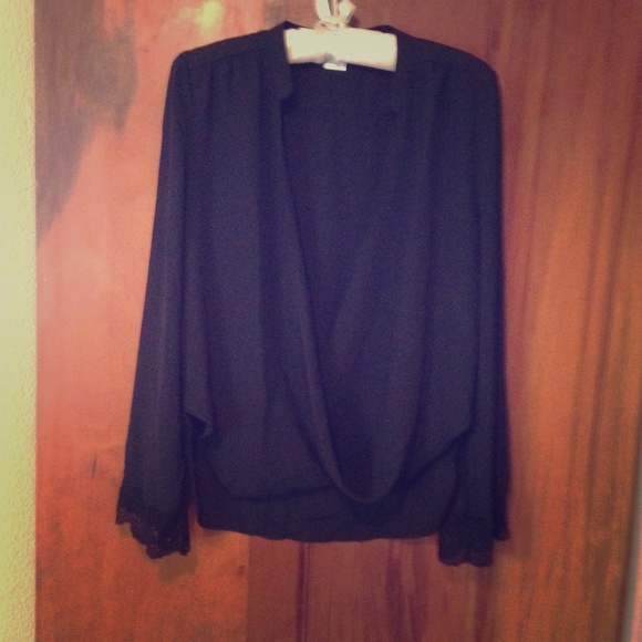Black blouse with lace detail, size S