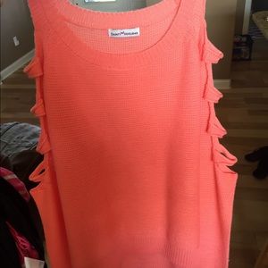 Knit sweater with holes along the arms