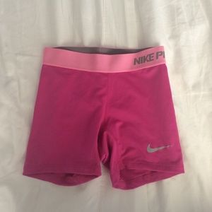 Hot pink nike pros
