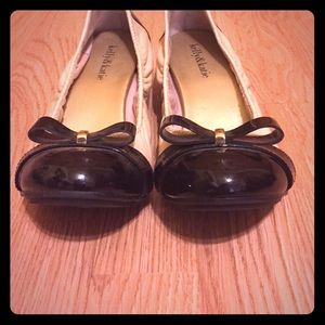 pink and black small wedged shoes