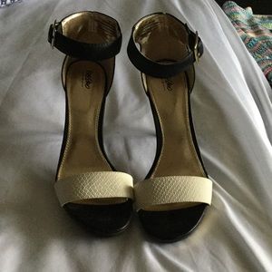 Black and white straps heels
