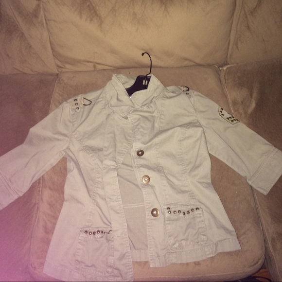 Light greenish jacket you can wear with anything .