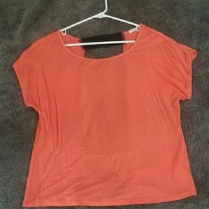 Orange top with semi-open back