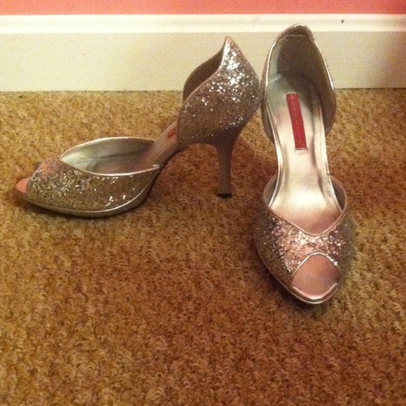 Silver sparkley 3 1/2 inch Bordello heels.