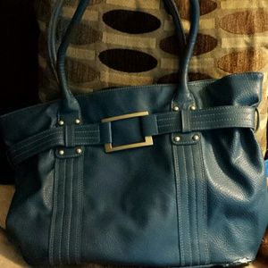 Used Blue Purse from Avon.