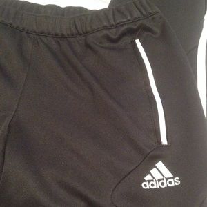 Adidas sweatpants.