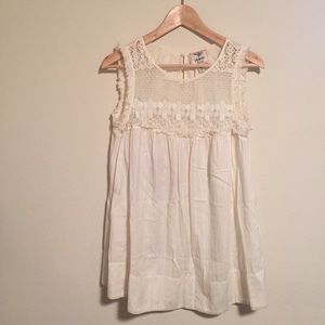 Fun tunic with lace detail.