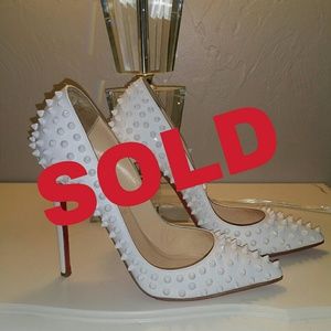 Christian Louboutin white spikes