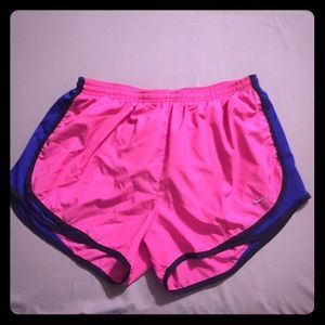 Nike running shorts pink and blue