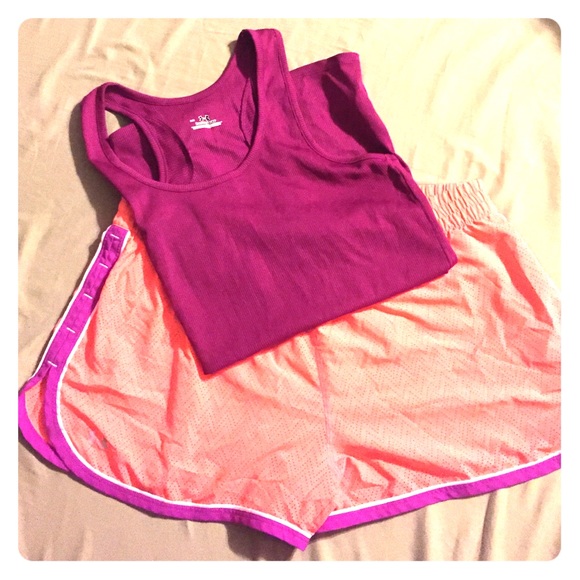 UA shirt shorts neon and purple sz L