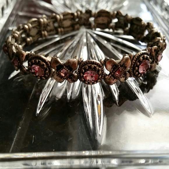 💜An X's & O's purple jeweled bracelet💜
