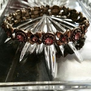 💜An X's & O's purple jeweled bracelet💜