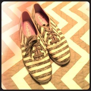 Gray and white striped Keds.