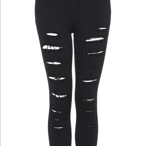 ISO, black rip jeans